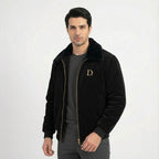 Front view of men's black velvet winter jacket featuring a black faux fur collar and gold "D" embroidery on the chest.
