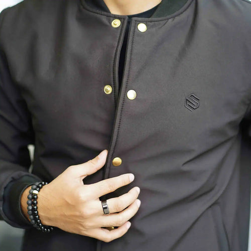 Men’s black softshell bomber jacket with front button closure – winter outerwear by Coder Stitch
