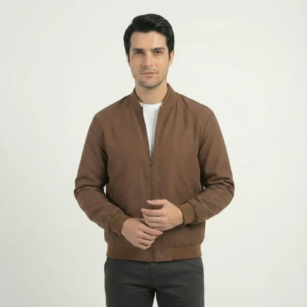 Front view of men's classic brown softshell bomber jacket with ribbed collar, cuffs, and hem, worn over a white t-shirt.