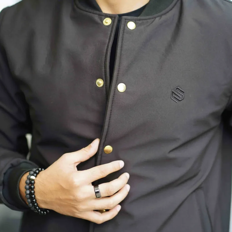 Men’s black softshell bomber jacket with front button closure – winter outerwear by Coder Stitch